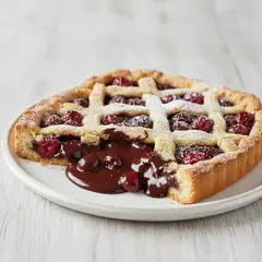 Crostata alle nocciole con ganache al fondente e amarene