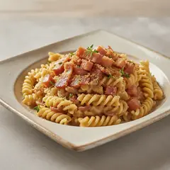 Fusilli con crema di scalogno e guanciale