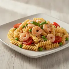 Fusilloni piselli, gamberetti e pomodorini