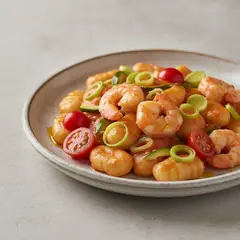 Gnocchi porro e gamberi