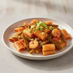 Mezzi paccheri con taccole e gamberi