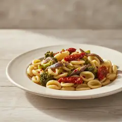 Orecchiette con broccoletti alici e pomodori secchi
