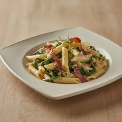 Pasta con agretti e speck