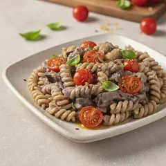 Pasta con crema di melanzane e pomodorini