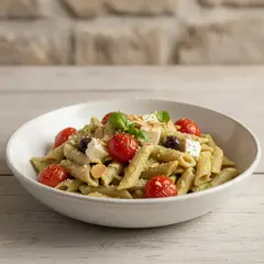 Pasta con pesto di mandorle e pomodorini confit