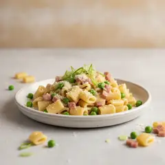 Pasta prosciutto e piselli cremosa