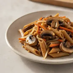 Penne al grano saraceno con funghi al wok
