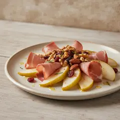 Pere e speck con frutta secca