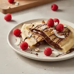 Piadina con ganache alle nocciole, lamponi e cocco
