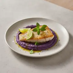 Rana pescatrice su crema di patate viola