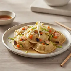Ravioli al vapore all'orientale con verdure e mazzancolle