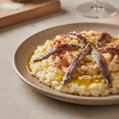 Risotto burro, alici e peperoni cruschi