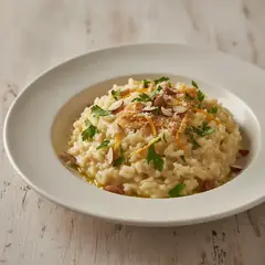 Risotto con prezzemolo, arancia e mandorle tostate