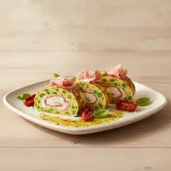 Rotolo ai piselli con crudo e pomodori secchi