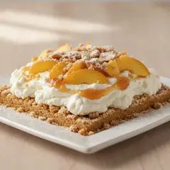 Sbriciolata senza cottura con crema di ricotta e pesche