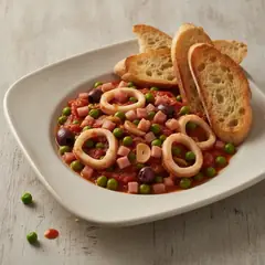 Seppie con piselli e pancetta