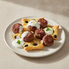 Sfoglie alle olive con polpettine di radicchio e crema di yogurt