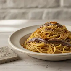 Spaghetti con le acciughe e il pangrattato