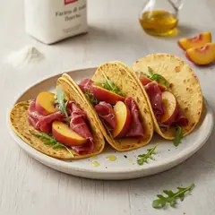 Tacos con bresaola e pesche