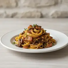 Tagliatelle con porcini e guanciale