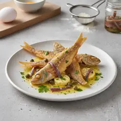 Triglie fritte con burro alle acciughe